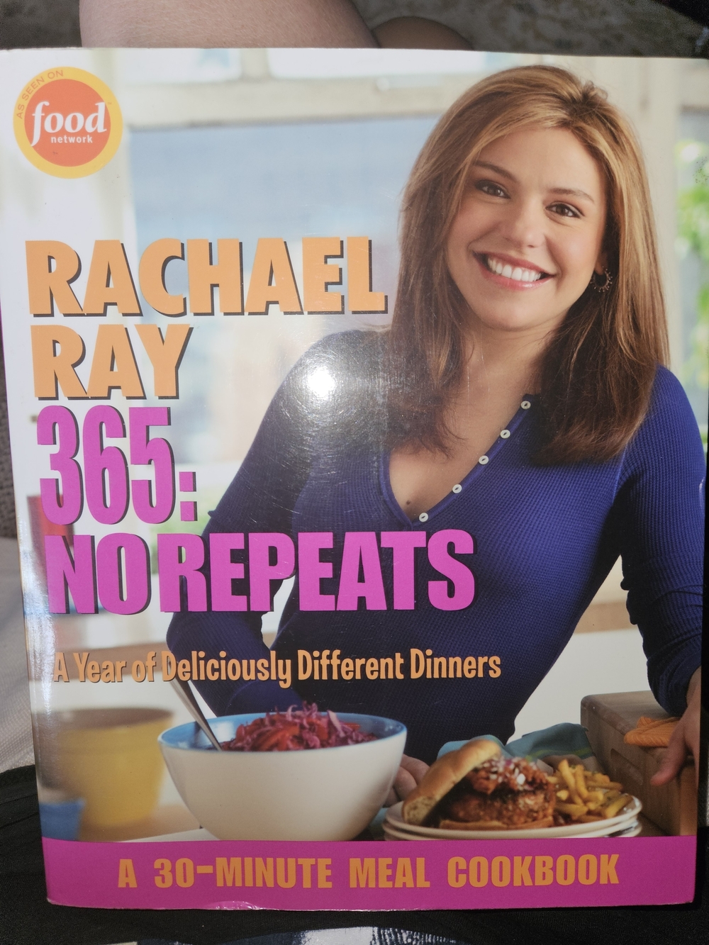 Rachael Ray Cookbook with Blue Cover and Pink Title Accents